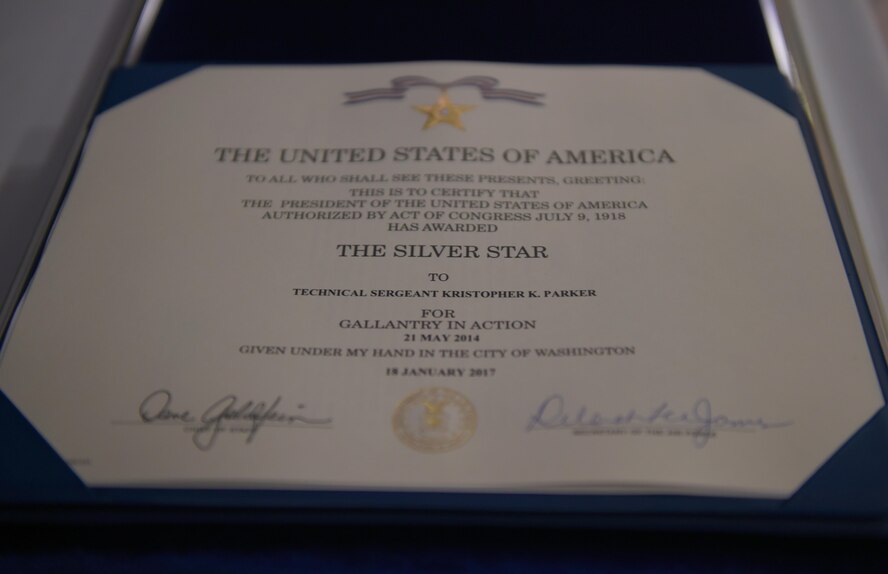 Retired U.S. Air Force Master Sgt. Kristopher Parker, an explosive ordnance disposal technician, received the Siler Star Medal March 17, 2017, at Dyess Air Force Base, Texas, for his courageous actions while deployed to Afghanistan in May of 2014. Parker distinguished himself by bravery and devotion to duty in connection with military operations against an armed enemy of the United States as an EOD team leader. (U.S. Air Force photo by Airman 1st Class Emily Copeland)