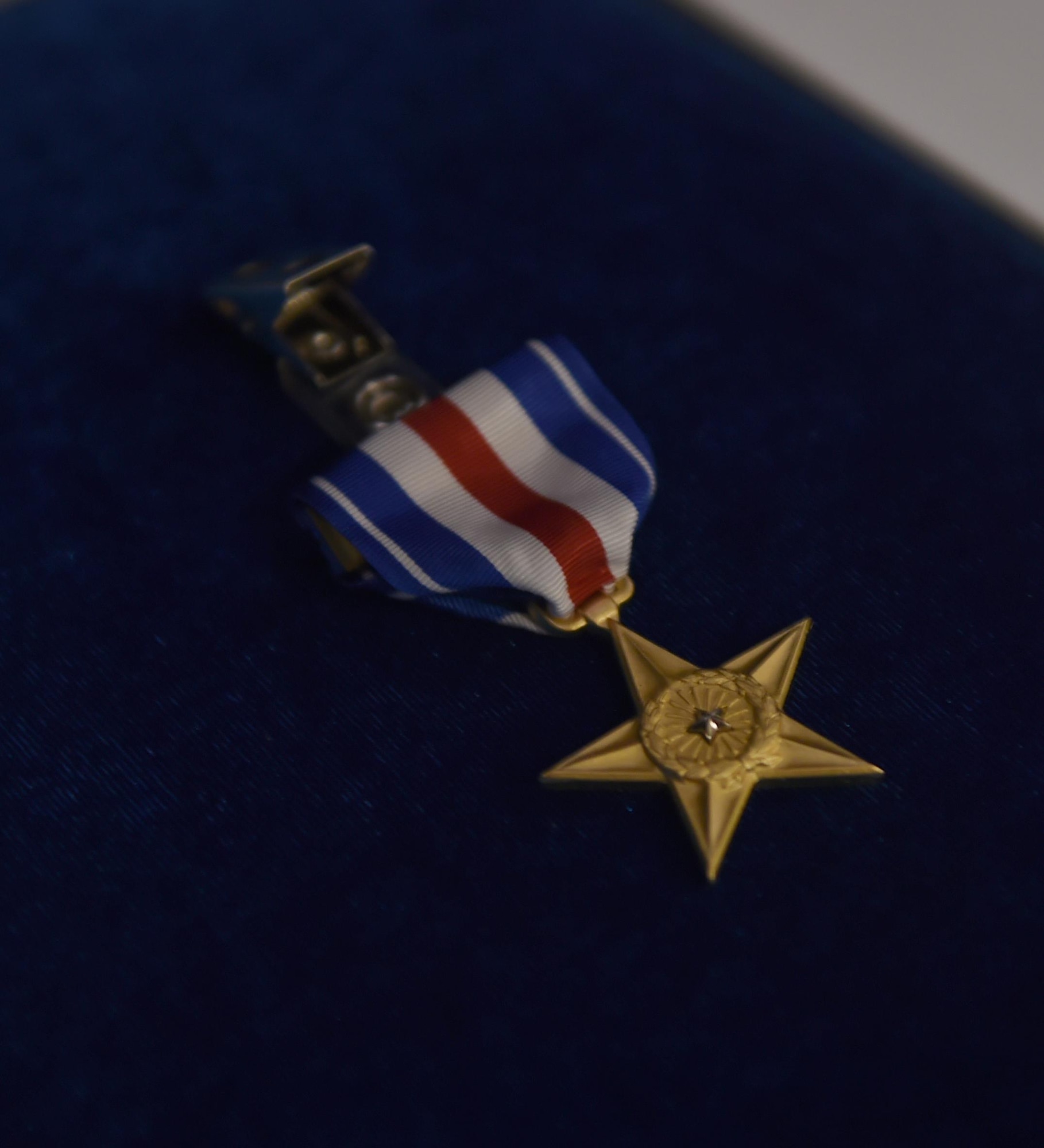 Retired U.S. Air Force Master Sgt. Kristopher Parker, was presented the Silver Star by General Robin Rand, commander of Air Force Global Strike Command March 17, 2017, at Dyess Air Force Base, Texas. Parker was awarded the Silver Star Medal for gallantry in action against an enemy of the United States during his deployment to Afghanistan in May of 2014. (U.S. Air Force photo by Airman 1st Class Emily Copeland)