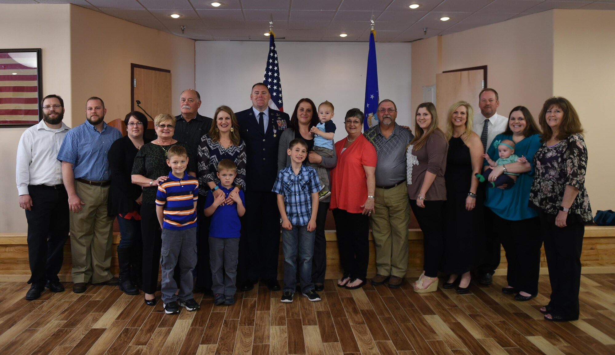 Retired U.S. Air Force Master Sgt. Kristopher Parker, an explosive disposal technician, stands with his friends and family after receiving his Silver Star Medal March 17, 2017, at Dyess Air Force Base, Texas. For Parker’s courage, valor and selfless sacrifice in the face of danger, the Air Force bestowed upon him the Silver Star, the U.S. Air Force’s third-highest decoration. (U.S. Air Force photo by Airman 1st Class Emily Copeland)