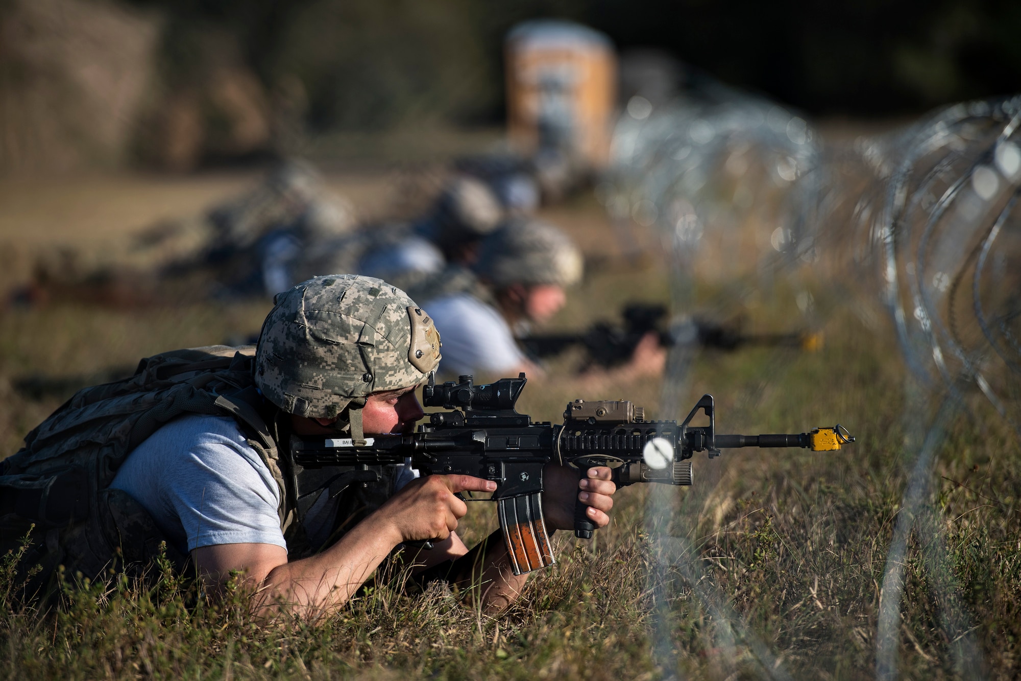 Staff Sgt. Joshua Bauer, 822d Base Defense Squadron fireteam leader, secures his sector of a defense fighting position during a Mission Readiness Exercise, March 11, 2017, at Avon Park Air Force Range, Fla. The MRX took place March 2-13 and ensured the 822d BDS could efficiently deploy anywhere in the world in less than 72 hours. The MRX took place March 2-13 and ensured the 822d BDS could efficiently deploy anywhere in the world in less than 72 hours. During the two week MRX, the squadron was evaluated on its ability to set-up a bare base, effectively thwart enemy attacks, run a secure Tactical Operation Center and maintain positive relationships with villagers in surrounding areas. (U.S. Air Force Photo by Airman 1st Class Janiqua P. Robinson)