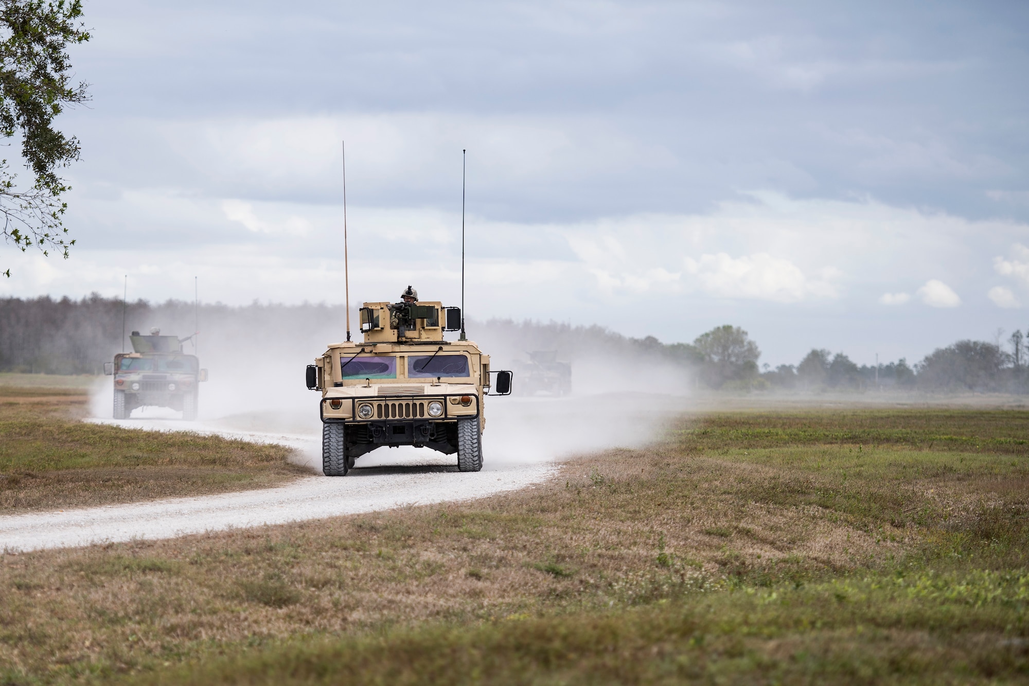 Airmen take Humvee out on patrol in response to reports of suspicious activity in a nearby village during a Mission Readiness Exercise, March 7, 2017, at Avon Park Air Force Range, Fla. The MRX took place March 2-13 and ensured the 822d Base Defense Squadron could efficiently deploy anywhere in the world in less than 72 hours. During the two week MRX, the squadron was evaluated on its ability to set-up a bare base, effectively thwart enemy attacks, run a secure Tactical Operation Center and maintain positive relationships with villagers in surrounding areas. (U.S. Air Force Photo by Airman 1st Class Janiqua P. Robinson)