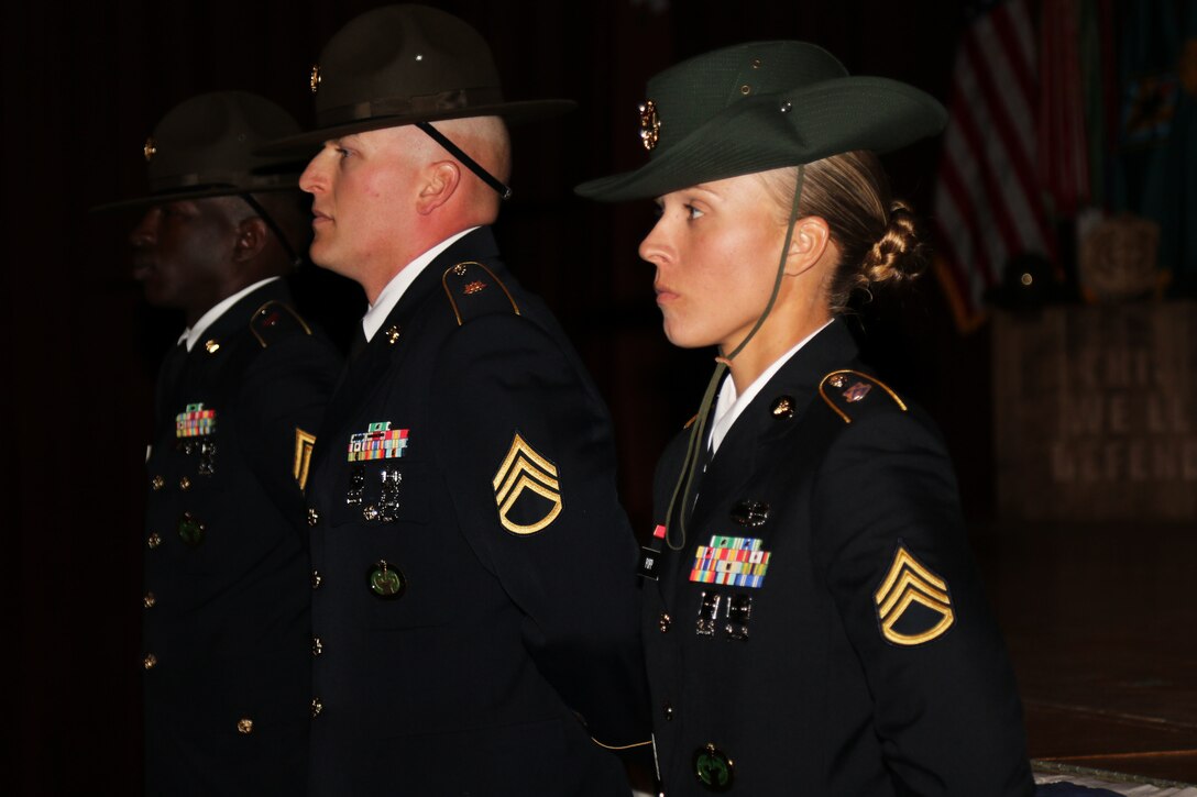Army Reserve Staff Sgt. Briana Popp stands before her class during her graduation from the Drill Sergeant Academy at Fort Jackson, S.C. March 8, 2017. Popp earned the titles of Iron Female and Distinguished Honor Graduate and will be a drill sergeant with the 98th Training Division (IET). Popp was the first female Distinguished Honor Graduate in the past six cycles and happened to graduate in March, which is Women's History Month. Coincidentally, Popp's graduation day was International Women's Day as well.  (U.S. Army Reserve Photo by Maj. Michelle Lunato/released)