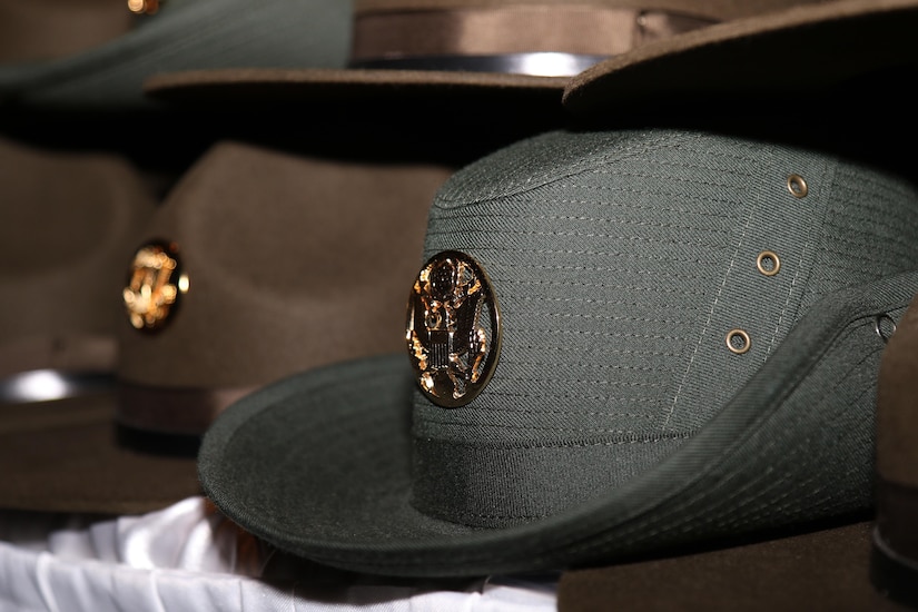 In February 1972, six Woman Army Corps noncommissioned officers from Fort McClellan, Ala., enrolled in the Drill Sergeant Program at Fort Jackson, S.C. Upon graduation, they were authorized to wear the newly designed female drill sergeant hat that was designed by Brig. Gen. Mildred C. Bailey. The design was taken from the Australian Bush Hat and was originally beige. The color changed to green in 1983 and remains in effect today.  (U.S. Army Reserve Photo by Maj. Michelle Lunato/released)