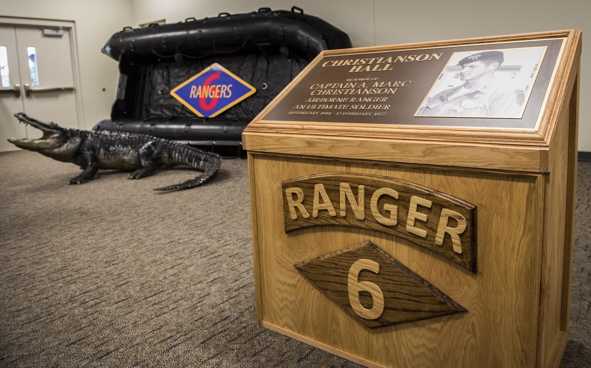 A plaque for Capt. A. Marc Christianson III stands in the newly dedicated Christianson Hall after the 6th Ranger Training Battalion’s headquarters building dedication ceremony March 17 at Eglin Air Force Base, Fla.  The building was dedicated to Christianson, who passed away on the training range in 1972.  (U.S. Air Force photo/Samuel King Jr.)