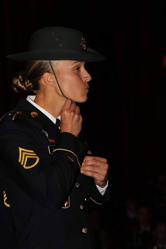 Army Reserve Staff Sgt. Briana Popp dons her campaign hat during her graduation from the Drill Sergeant Academy at Fort Jackson, S.C. March 8, 2017. Popp earned the titles of Iron Female and Distinguished Honor Graduate and will be a drill sergeant with the 98th Training Division (Initial Entry Training). Popp, a Columbus, Ga. resident, was the first female Distinguished Honor Graduate in the past six cycles and happened to graduate in March, which is Women's History Month. Coincidentally, Popp's graduation day was International Women's Day as well.  (U.S. Army Reserve Photo by Maj. Michelle Lunato/released)