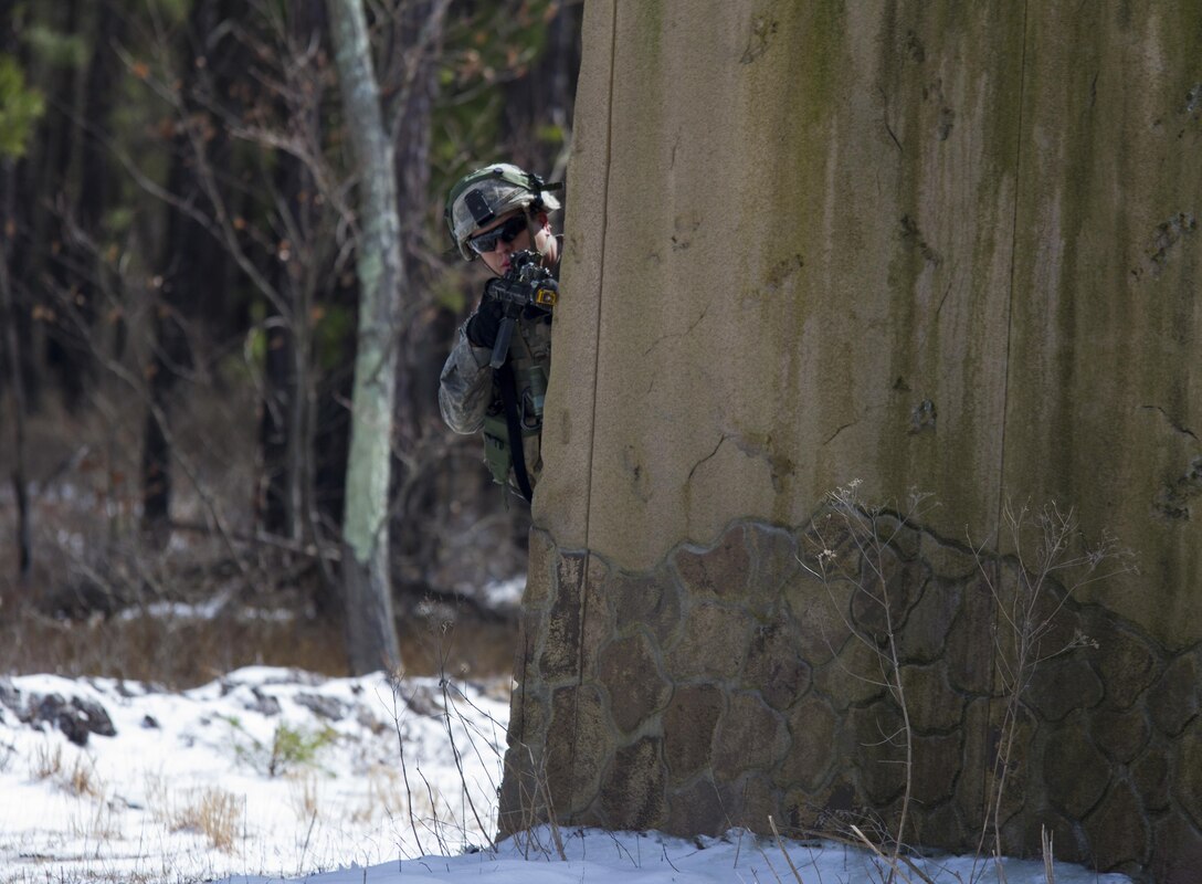 U.S. Army Soldiers assigned to Company A (Easy Company), 2nd Battalion, 506th Infantry Regiment, 101st Airborne Division (Air Assault) attack enemy forces during a hasty raid training exercise at Warrior Exercise 78-17-01 at Hosteel Village near Joint base McGuire-Dix-Lakehurst March 16, 2017. Army Reserve Soldiers assigned to the 363rd Military Police Company served as the oppositional force for Easy Company during the exercise. Easy Company kicked off WAREX 78-17-01 during a joint-component airfield seizure on March 13, 2017. Roughly 60 units from the Army Reserve, Army, Air Force, Marine Reserves, and Canadian Armed Forces participated in the 84th Training Command’s joint training exercise, WAREX 78-17-01 from March 8 to April 1, 2017; the WAREX is a large-scale collective training event designed to assess units’ combat capabilities as America’s Army Reserve continues to build the most capable, combat-ready and lethal Federal Reserve force in the history of the Nation. (Army Reserve Photo by Sgt. Stephanie Ramirez/ Released)