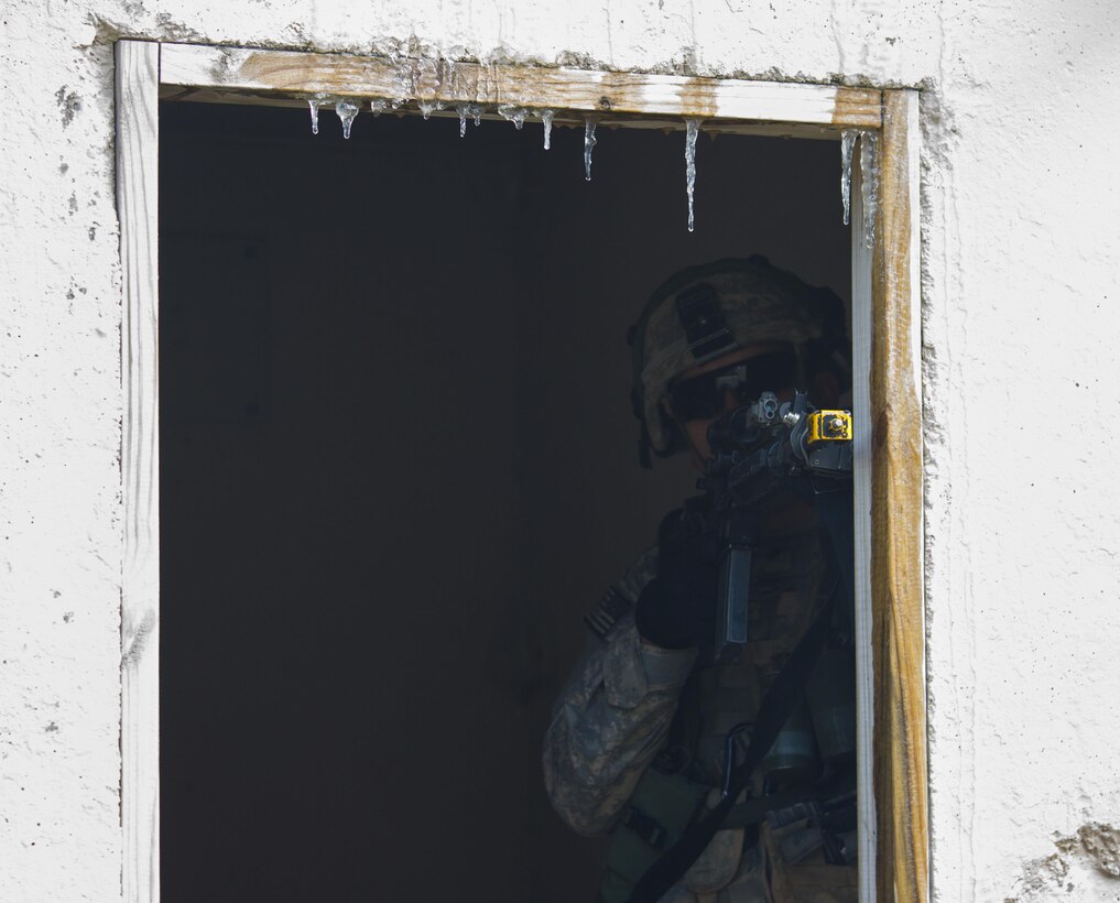 U.S. Army Soldiers assigned to Company A (Easy Company), 2nd Battalion, 506th Infantry Regiment, 101st Airborne Division (Air Assault) attack enemy forces during a hasty raid training exercise at Warrior Exercise 78-17-01 at Hosteel Village near Joint base McGuire-Dix-Lakehurst March 16, 2017. Army Reserve Soldiers assigned to the 363rd Military Police Company served as the oppositional force for Easy Company during the exercise. Easy Company kicked off WAREX 78-17-01 during a joint-component airfield seizure on March 13, 2017. Roughly 60 units from the Army Reserve, Army, Air Force, Marine Reserves, and Canadian Armed Forces participated in the 84th Training Command’s joint training exercise, WAREX 78-17-01 from March 8 to April 1, 2017; the WAREX is a large-scale collective training event designed to assess units’ combat capabilities as America’s Army Reserve continues to build the most capable, combat-ready and lethal Federal Reserve force in the history of the Nation. (Army Reserve Photo by Sgt. Stephanie Ramirez/ Released)