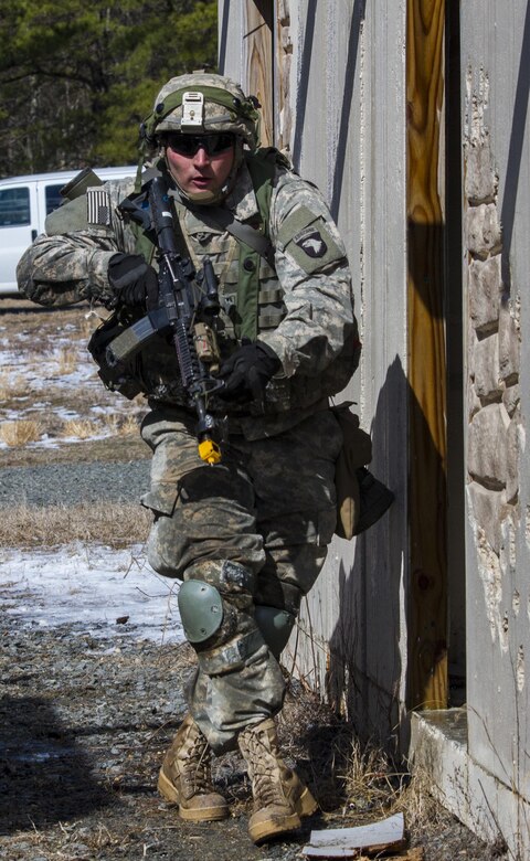 U.S. Army Soldiers assigned to Company A (Easy Company), 2nd Battalion, 506th Infantry Regiment, 101st Airborne Division (Air Assault) attack enemy forces during a hasty raid training exercise at Warrior Exercise 78-17-01 at Hosteel Village near Joint base McGuire-Dix-Lakehurst March 16, 2017. Army Reserve Soldiers assigned to the 363rd Military Police Company served as the oppositional force for Easy Company during the exercise. Easy Company kicked off WAREX 78-17-01 during a joint-component airfield seizure on March 13, 2017. Roughly 60 units from the Army Reserve, Army, Air Force, Marine Reserves, and Canadian Armed Forces participated in the 84th Training Command’s joint training exercise, WAREX 78-17-01 from March 8 to April 1, 2017; the WAREX is a large-scale collective training event designed to assess units’ combat capabilities as America’s Army Reserve continues to build the most capable, combat-ready and lethal Federal Reserve force in the history of the Nation. (Army Reserve Photo by Sgt. Stephanie Ramirez/ Released)