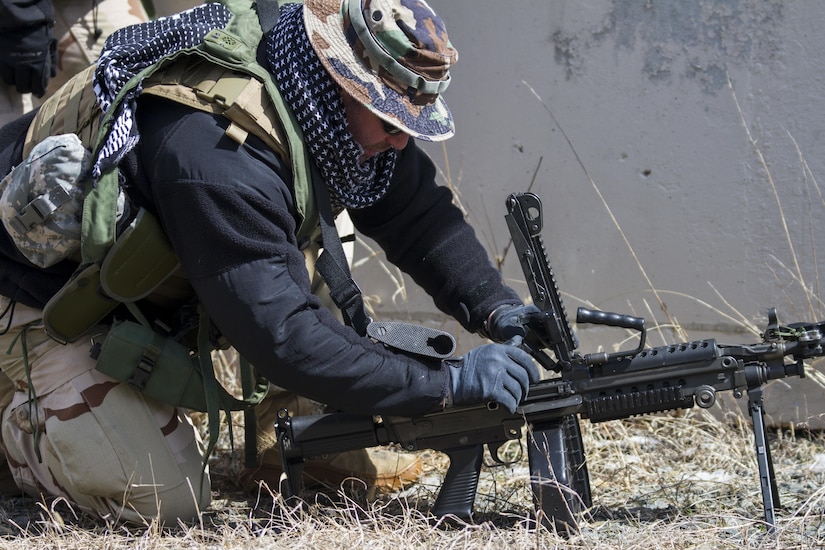 A U.S. Army Reserve Soldier assigned to the 78th Training Division, clears the chamber of his weapon before U.S. Army Soldiers assigned to the 101st Airborne Division (Air Assault) conduct a hasty raid at Hosteel Village near Joint base McGuire-Dix-Lakehurst on March 16, 2017, as a part of Warrior Exercise 78-17-01 which is designed to assess a units’ combat capabilities.  Army Reserve Soldiers assigned to the 363rd Military Police Company served as the oppositional force for Easy Company, 2nd Battalion, 506th Infantry Regiment, 101st Airborne Division during the exercise. Roughly 60 units from the U.S. Army Reserve, U.S. Army, U.S. Air Force, and Canadian Armed Forces are participating in the 84th Training Command’s joint training exercise, WAREX 78-17-01, at Joint Base McGuire-Dix-Lakehurst from March 8 until April 1, 2017; the WAREX is a large-scale collective training event designed to simulate real-world scenarios as America’s Army Reserve continues to build the most capable, combat-ready, and lethal Federal Reserve force in the history of the Nation. (Army Reserve Photo by Sgt. Stephanie Ramirez/ Released)