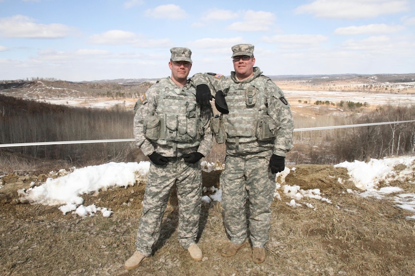 U.S. Army Reserve Staff Sgt. Jeshua Moore (left) and Sgt. Gereld Moore, both with the 327th Engineer Company, 416th Theater Engineer Command, are identical twins running gunnery crews at Operation Cold Steel 2017. Operation Cold Steel is the U.S. Army Reserve's crew-served weapons qualification and validation exercise to ensure that America's Army Reserve units and Soldiers are trained and ready to deploy on short-notice and bring combat-ready and lethal firepower in support of the Army and our joint partners anywhere in the world.