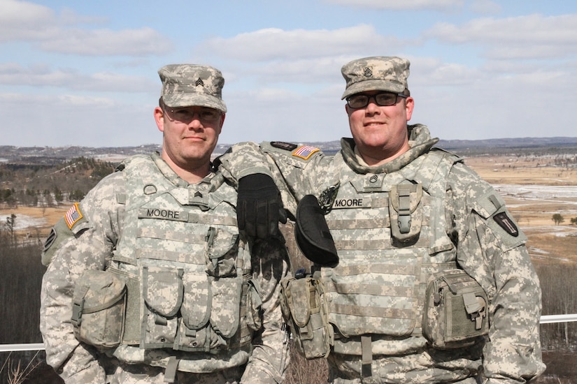 U.S. Army Reserve Staff Sgt. Jeshua Moore (left) and Sgt. Gereld Moore, both with the 327th Engineer Company, 416th Theater Engineer Command, are identical twins running gunnery crews at Operation Cold Steel 2017. Operation Cold Steel is the U.S. Army Reserve's crew-served weapons qualification and validation exercise to ensure that America's Army Reserve units and Soldiers are trained and ready to deploy on short-notice and bring combat-ready and lethal firepower in support of the Army and our joint partners anywhere in the world.