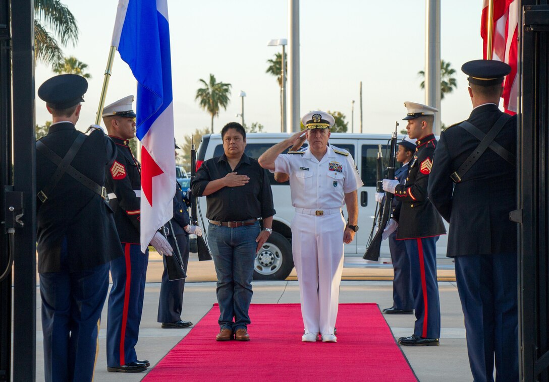 MIAMI (March 20, 2017) -- Navy Adm. Kurt W. Tidd, commander of U.S. Southern Command, and Panama's Minister of Security, Alexis Bethancourt, render honors during Bethancourt's arrival for an official visit to SOUTHCOM headquarters. Bethancourt met with Tidd to discuss continued security cooperation.  (Photo by Army Master Sgt. Clifton McDonald, U.S. Southern Command Public Affairs)