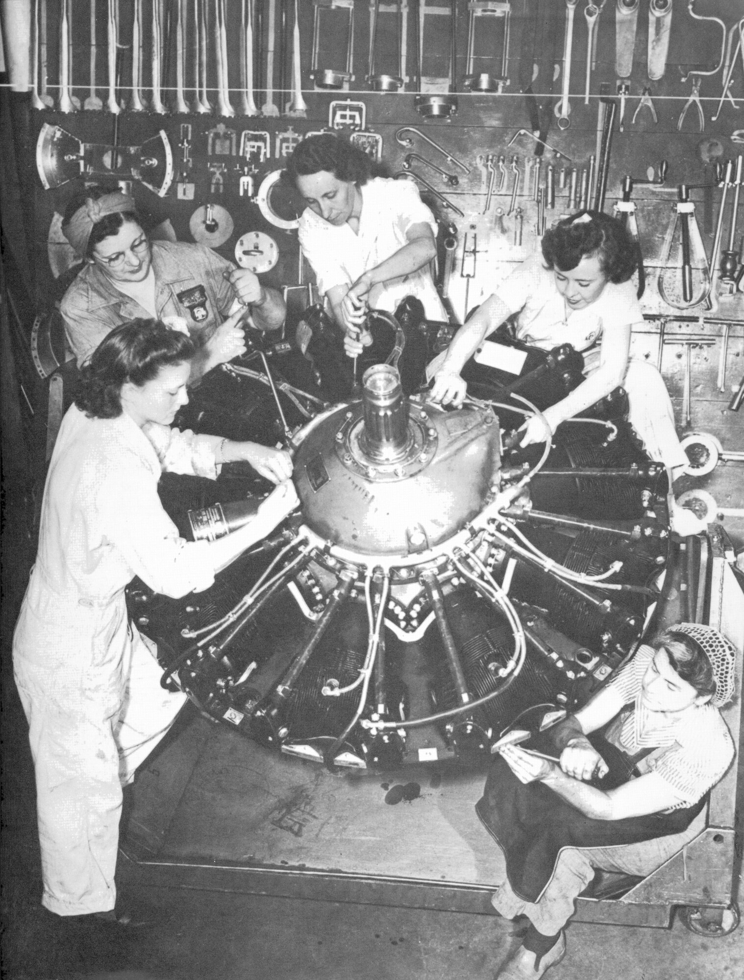 An all-woman engine crew at Tinker Field during World War II Era. Women comprised 65 percent of the aircraft industry by 1943. (Photo courtesy of Tinker History Office)