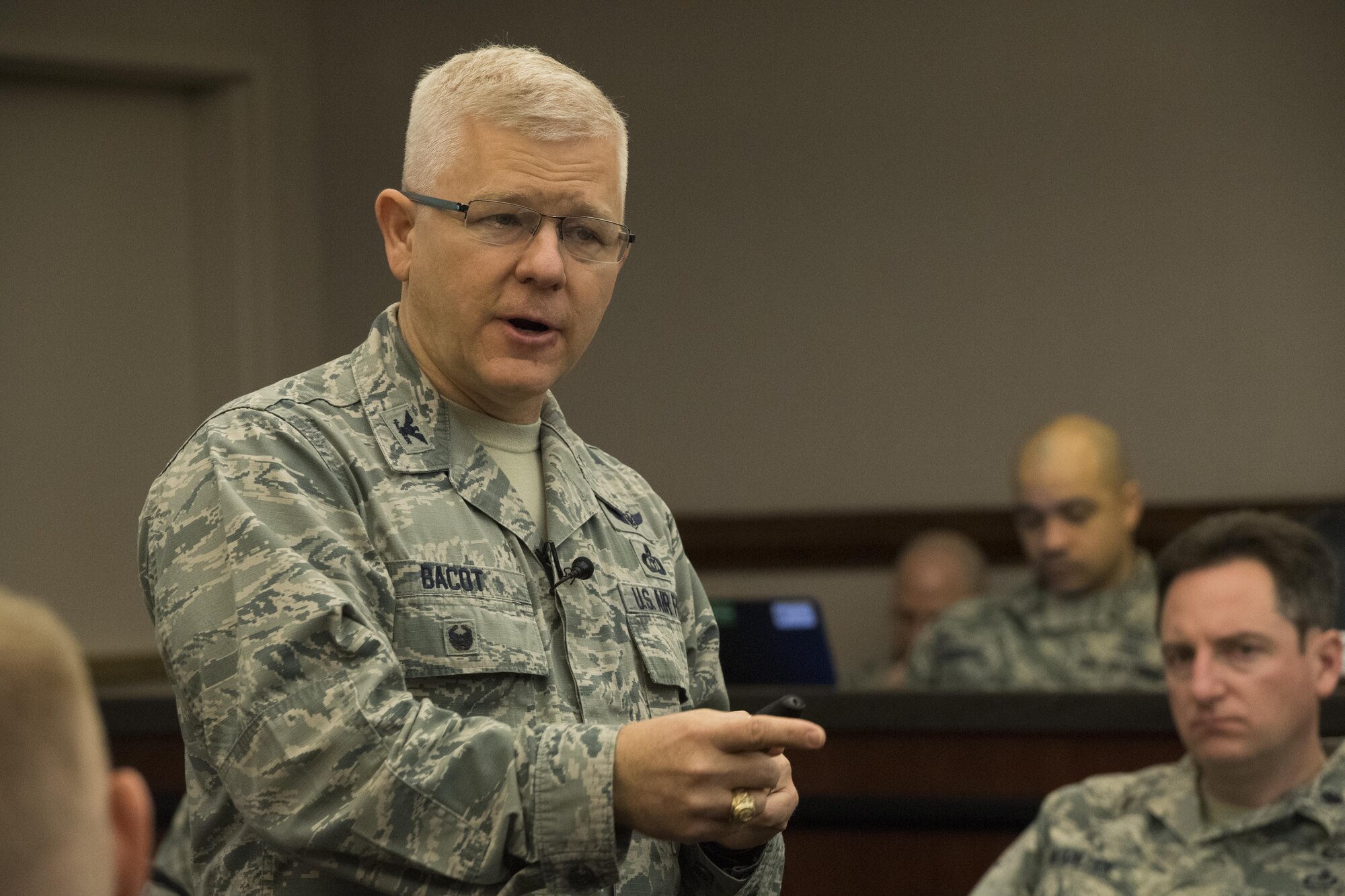 Col. David Bacot, Air Combat Command chief of weather operations, speaks during an annual weather conference at Joint Base Langley-Eustis, March 13, 2017. The purpose of the conference was to shape the future of the weather force by discussing topics that affect the worldwide areas in the Air Force. Additionally, it gave leaders an opportunity to brainstorm solutions to rising concerns in the career field. (U.S. Air Force photo by Staff Sgt. Nick Wilson)