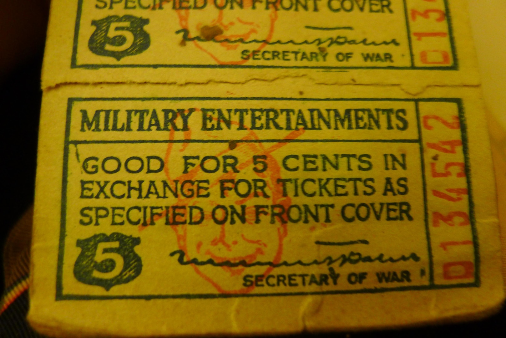 A ticket booklet gave "doughboys" access to movies and other entertainment while on liberty, en route to the combat zone.