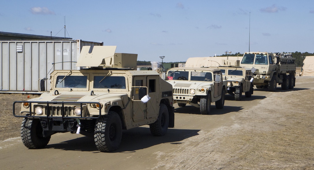 A convoy of High Mobility Multipurpose Wheeled Vehicle (HMMWV) and Light Medium Tactical Vehicles (LMTV) transport a platoon of military policemen assigned to 340th Military Police Co., 333rd Military Police Brigade, 200th Military Police Command, U.S. Army Reserve, to their tactical assembly area at Lakehurst Maxfield Field, N.J., Mar 19, 2017, during Warrior Exercise 78-17-01. WAREX 78-17-01 is an important step in building the most capable, combat-ready and lethal force in history. (U.S. Army Reserve photo by Staff Sgt. George F. Gutierrez, 201st Press Camp Headquarters/ Released)