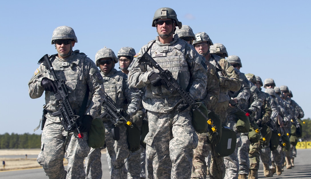 A platoon of military policemen assigned to 340th Military Police Co., 333rd Military Police Brigade, 200th Military Police Command, U.S. Army Reserve, march to an tactical assembly area after arriving at Lakehurst Maxfield Field, N.J., Mar 19, 2017, during Warrior Exercise 78-17-01. WAREX 78-17-01 is an important step in building the most capable, combat-ready and lethal force in history. (U.S. Army Reserve photo by Staff Sgt. George F. Gutierrez, 201st Press Camp Headquarters/ Released)