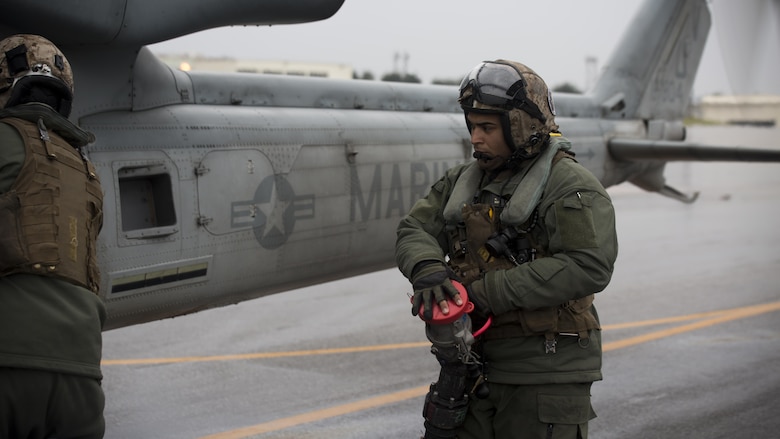 Sgt. Kevin Carpio, a UH-1Y crew chief with Marine Light Attack Helicopter Squadron 267, currently supporting Marine Aircraft Group 36, 1st Marine Aircraft Wing, III Marine Expeditionary Force through the unit deployment program, finishes refueling the UH-1Y Venom at Marine Corps Air Station Iwakuni, Japan, March 11, 2017. The squadron, based out of Camp Pendleton, California, validated the long-range capability of the auxiliary fuel tanks on their H-1 platform helicopters by flying 314 nautical miles during one leg of the four-day mission, March 10.