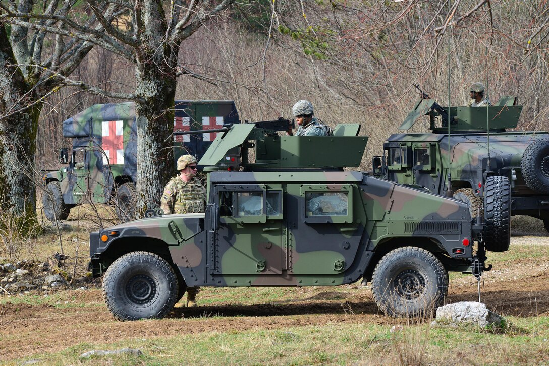 U.S. soldiers prepare to drive their camouflaged trucks in convoy formation during exercise Vanguard Proof 17 at Pocek Range in Postonja, Slovenia, March 19, 2017. Army photo by Paolo Bovo