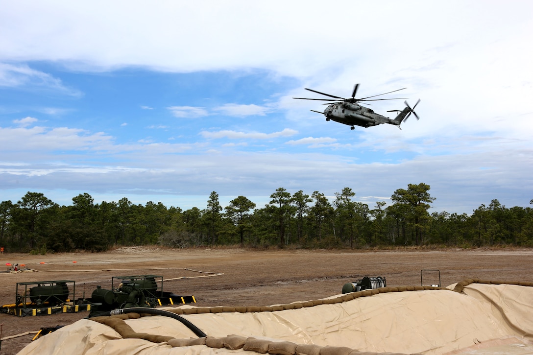 MARINE CORPS AIR STATION CHERRY POINT, N.C.— A CH-53E Super Stallion prepares to land on a Forward Arming and Refueling Point during Marine Wing Support Squadron 274’s field exercise aboard Marine Corps Outlying Field Atlantic, N.C., March 10, 2017. The Super Stallion transported fuel to MWSS-274’s FARP to practice replenishing their fuel supply. Marines from MWSS-274, Marine Aircraft Group 29, 2nd Marine Aircraft Wing, established an air facility aboard Marine Corps Auxiliary Landing Field Bogue capable of providing all airfield and air base support functions to MAG-29 squadrons, including a FARP at Atlantic. (U.S. Marine Corps photo by Cpl. Jason Jimenez/ Released)