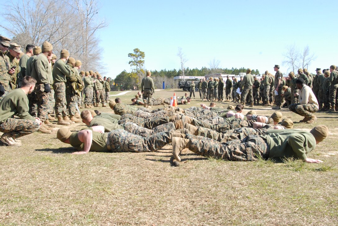 On March 16th, 2017 MCES held its annual Engineer Field Meet on Ellis Field. The annual field meet is held to celebrate the patron saint of engineers, St. Patrick; as well as build camaraderie, espirit de corps, and compete for the four-leaf clover trophy. Two teams, eleven Marines each; lay across a rope and await the starting whistle.