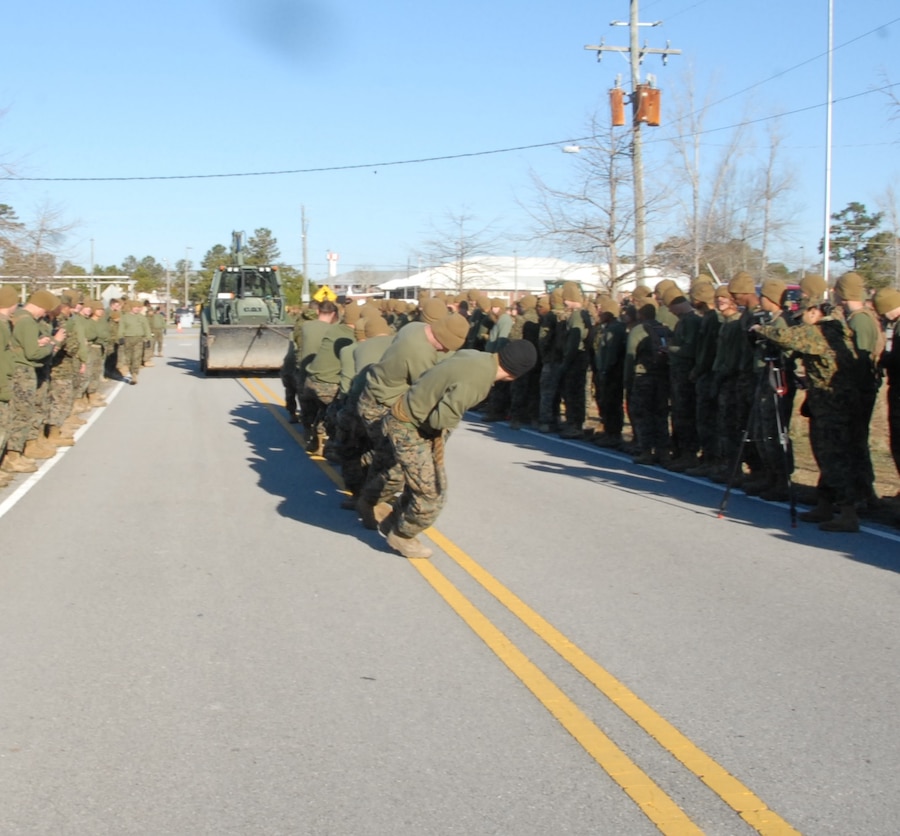 On March 16th, 2017 MCES held its annual Engineer Field Meet on Ellis Field. The annual field meet is held to celebrate the patron saint of engineers, St. Patrick; as well as build camaraderie, espirit de corps, and compete for the four-leaf clover trophy. During the Backhoe Loader (BHL) pull, a team of Marines pulls a BHL from a rest position towards a finish line.