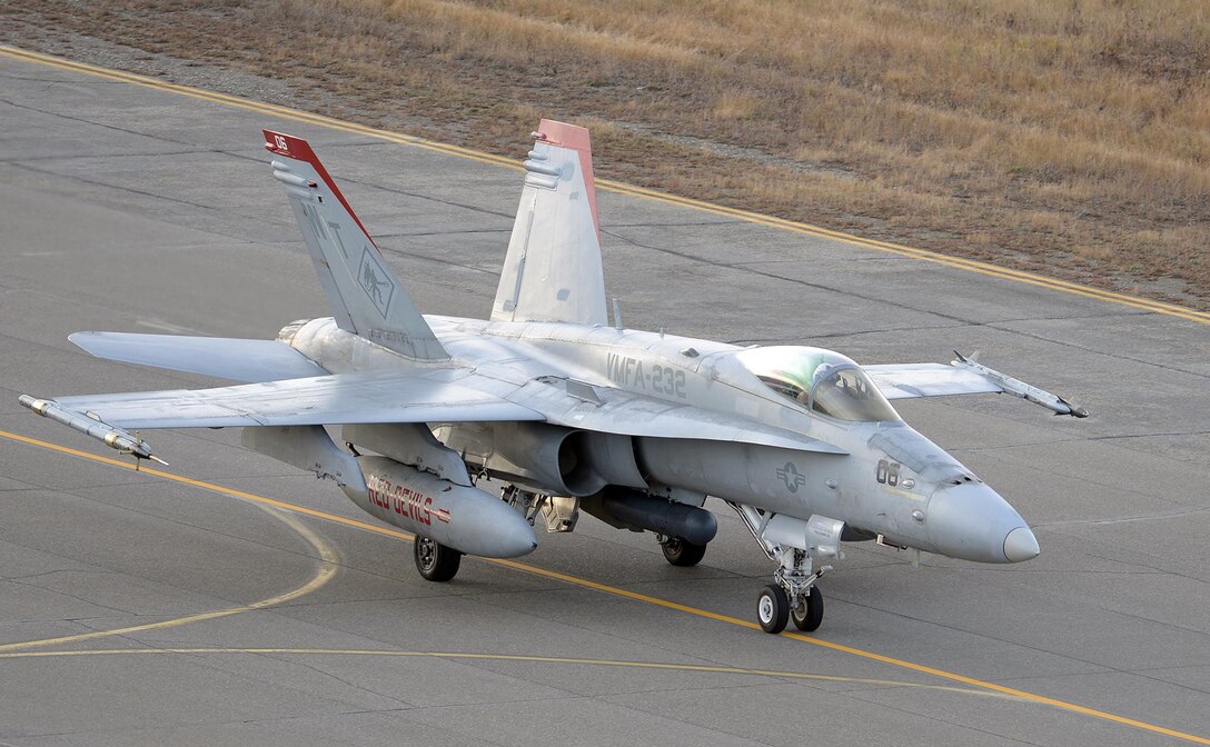 A U.S. Marine Corps pilot taxis his F/A-18C Hornet assigned to Marine Fighter Attack Squadron (VMFA) 232 out of Marine Corps Air Station Miramar, Calif., toward its ramps space after returning to Eielson Air Force Base, Alaska, Oct. 10, 2016, after the first combat training mission of RED FLAG-Alaska (RF-A) 17-1. RF-A is a series of Pacific Air Forces commander-directed field training exercises for U.S. and partner nation forces, which enables U.S. Marines in units like VMFA-232 to prepare for future combat and contingency operations in a realistic threat environment inside the largest instrumented air, ground and electronic combat training range in the world. (U.S. Air Force photo by Master Sgt. Karen J. Tomasik)