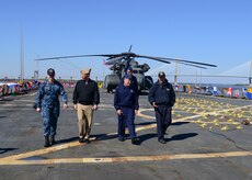 U.S. Navy Lt. David Pagan, right, gives a tour to Joint Base Charleston leadership aboard the USS Whidbey Island (LSD 41) at Union the Pier Terminal March 16, 2017. U.S. Navy amphibious dock landing ship USS Whidbey Island (LSD 41) visited Charleston, South Carolina over St. Patrick’s Day Weekend. 