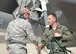 Lt. Col. Matthew Vedder, 63rd Fighter Squadron commander, shakes hands with Airman 1st Class Joshua Cote, 61st Aircraft Maintenance Unit F-35 Lightning II crew chief after landing March 20, 2017, at Luke Air Force Base, Ariz. This is the first F-35 for the 63rd FS and marks the 51st F-35 for Luke. (U.S. Air Force photo by Senior Airman James Hensley)