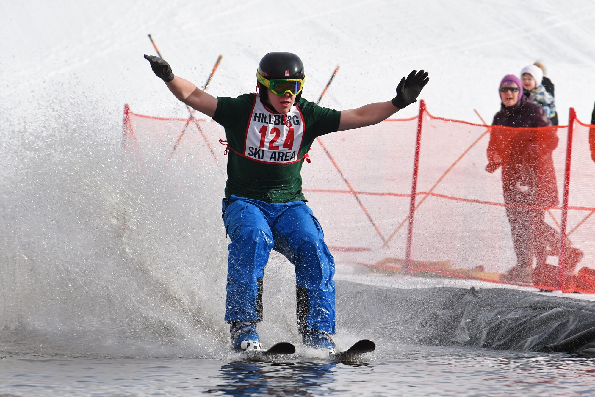 Joint Base Elmendorf-Richardson personnel and families participate in the Slush Cup at the Hillberg Ski Area, March 19, 2017. The Slush Cup is an annual event where skiers and snowboarders try to make it across a slush pond without falling. 