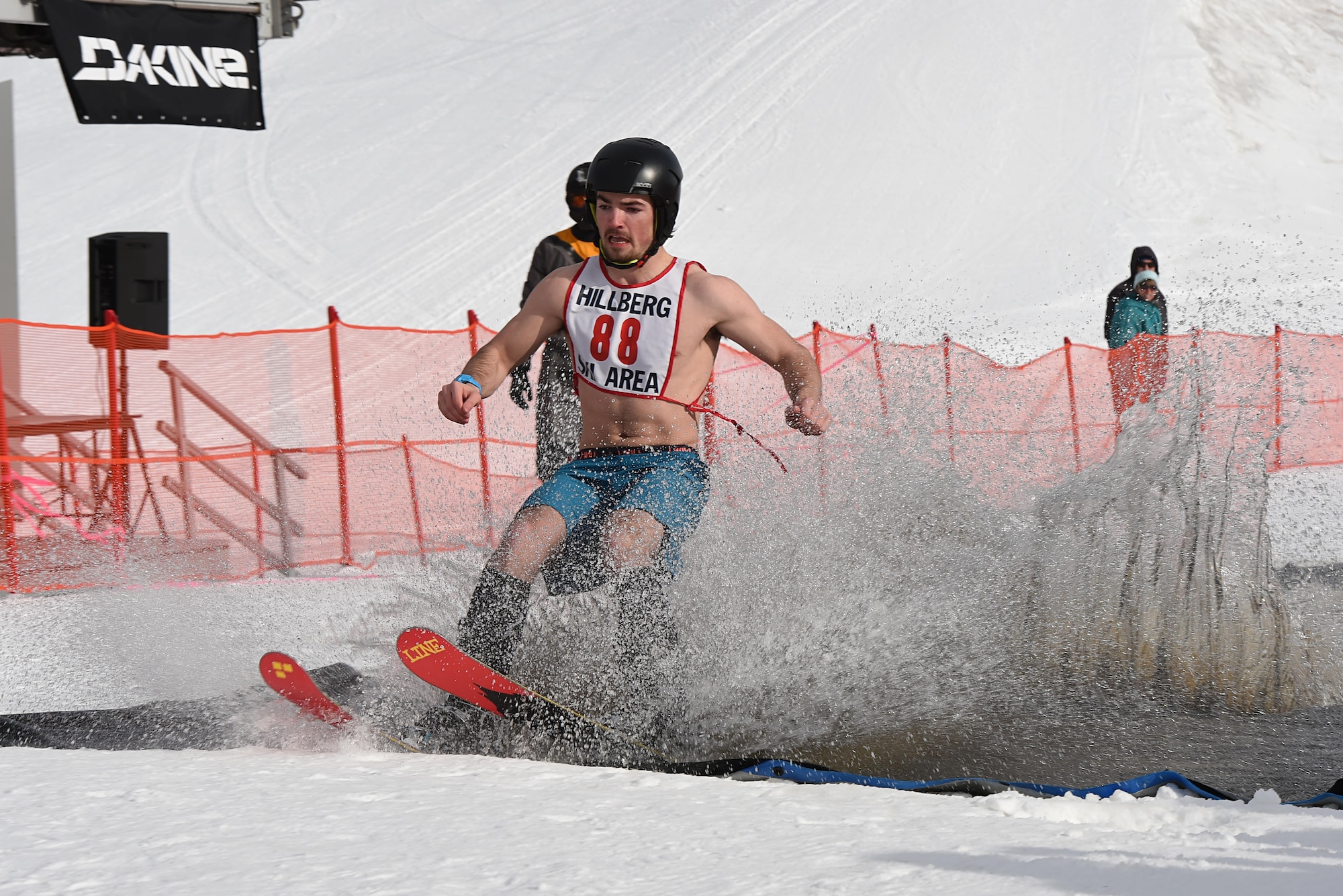 Joint Base Elmendorf-Richardson personnel and families participate in the Slush Cup at the Hillberg Ski Area, March 19, 2017. The Slush Cup is an annual event where skiers and snowboarders try to make it across a slush pond without falling. 