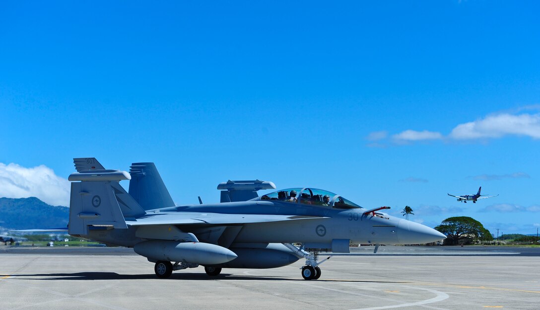 Four EA-18G Growlers arrived at Joint Base Pearl Harbor-Hickam before moving on to Australia, Feb. 16, 2017.  The Growler is an electronic attack aircraft capable of proving force level electronic warfare support by disrupting, deceiving or denying a broad range of electronic systems.  (U.S. Air Force photo by Tech. Sgt. Heather Redman)