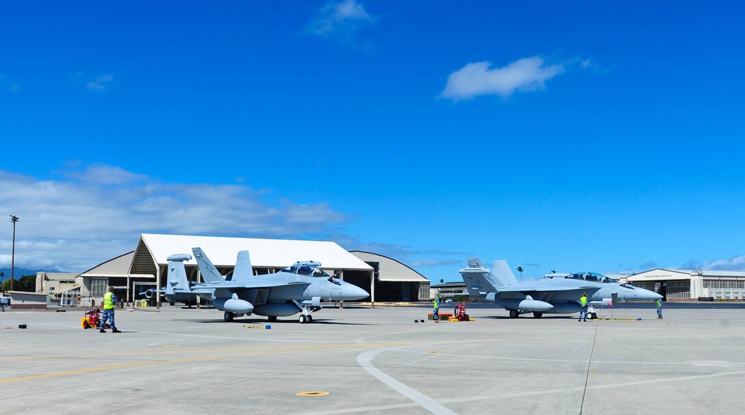 Four EA-18G Growlers arrived at Joint Base Pearl Harbor-Hickam before moving on to Australia, Feb. 16, 2017.  The Growler is an electronic attack aircraft capable of proving force level electronic warfare support by disrupting, deceiving or denying a broad range of electronic systems.  (U.S. Air Force photo by Tech. Sgt. Heather Redman)