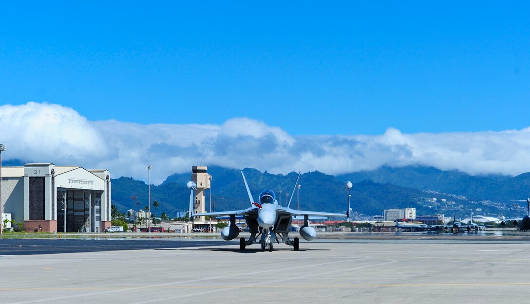 Four EA-18G Growlers arrived at Joint Base Pearl Harbor-Hickam before moving on to Australia, Feb. 16, 2017.  The Growler is an electronic attack aircraft capable of proving force level electronic warfare support by disrupting, deceiving or denying a broad range of electronic systems.  (U.S. Air Force photo by Tech. Sgt. Heather Redman)