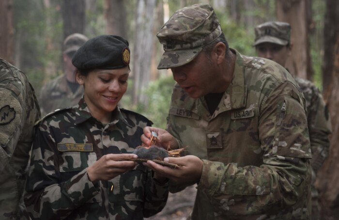 SCHOFIELD BARRACKS, Hawaii - (Feb. 21, 2017) – Capt. Rita Thapa, a Nepalese soldier, participates in jungle survival training with U.S. soldiers at the 25th Infantry Division’s Jungle Operations Training Center. The 25th Infantry Division hosted a delegation with female Nepalese Army officers to share information, techniques, tactics and procedures in order to promote the effectiveness and integration of females into combat roles. (Department of Defense photo by Petty Officer 2nd Class Aiyana S. Paschal)