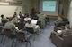 U.S. Air Force and Japan Air Self-Defense Force pilots sit in a dissimilar air combat-training brief at Misawa Air Base, Japan, March 17, 2017. During the brief, personnel discussed any mistakes, communication problems and tactic differences that occurred during the mission. (U.S. Air Force photo by Senior Airman Jarrod Vickers)
