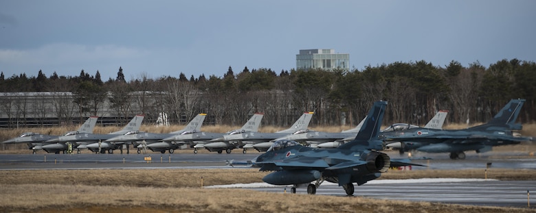 F-16 Fighting Falcons and F-2 Viper Zeros prepare for take-off during a dissimilar air combat-training at Misawa Air Base, Japan, March 17, 2017. The F-16s had the duty of providing a suppression of enemy air defenses and escorting the F-2s into the targets area. (U.S. Air Force photo by Senior Airman Jarrod Vickers)
