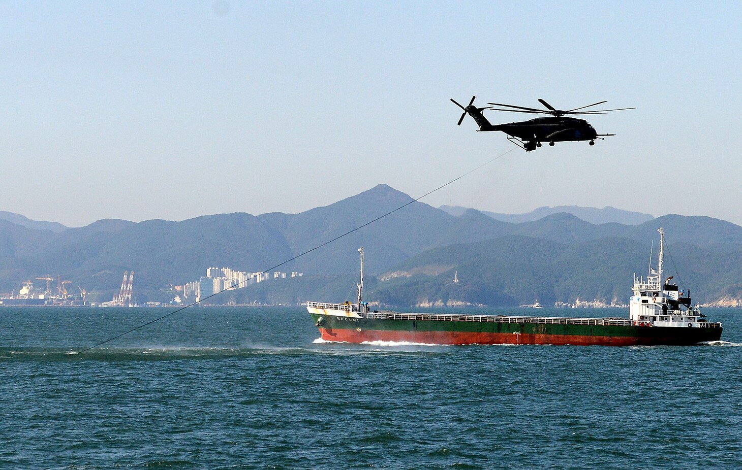 A U.S. Navy MH-53E Sea Dragon helicopter assigned to Detachment 1, Helicopter Mine Countermeasures Squadron (HM) 14 tows sonar equipment through the water in support of exercise Clear Horizon 2014 in the East China Sea Oct. 23, 2014. Clear Horizon is an annual bilateral exercise between the U.S. and South Korean navies designed to enhance cooperation and improve capabilities in mine countermeasure operations. (U.S. Navy photo by Mass Communication Specialist 1st Class Frank L. Andrews/Released)