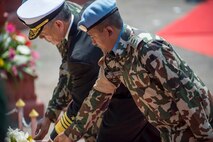 U.S. Pacific Command commander Admiral Harry Harris lays a wreath at the Martyr’s Memorial in remembrance of fallen Nepalese peace keepers in Nepal during the opening ceremony of exercise Shanti Prayas III. Shanti Prayas III is a multinational United Nations peacekeeping exercise designed to provide pre-deployment training to U.N. partner countries in preparation for real-world peacekeeping operations. (U.S. Navy Photo by Petty Officer 2nd Class Taylor Mohr)
