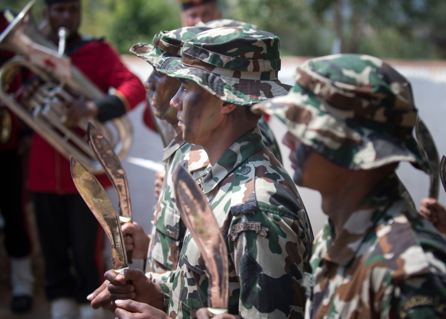 Nepalese army rangers known as “Ghurkas” perform a kukiri knife demonstration during the opening ceremony of exercise Shanti Prayas III in Nepal. Shanti Prayas III is a multinational United Nations peacekeeping exercise designed to provide pre-deployment training to U.N. partner countries in preparation for real-world peacekeeping operations. (U.S. Navy Photo by Petty Officer 2nd Class Taylor Mohr)