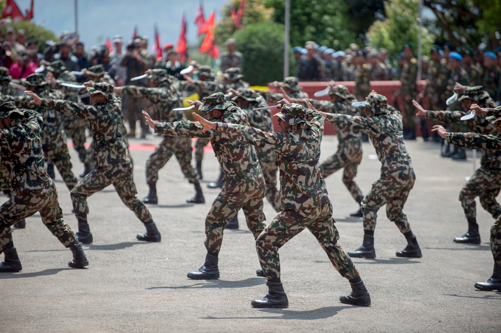 Nepalese army rangers known as “Ghurkas” perform a kukiri knife demonstration during the opening ceremony of exercise Shanti Prayas III in Nepal. Shanti Prayas III is a multinational United Nations peacekeeping exercise designed to provide pre-deployment training to U.N. partner countries in preparation for real-world peacekeeping operations. (U.S. Navy Photo by Petty Officer 2nd Class Taylor Mohr)