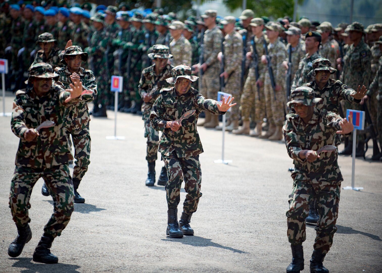 Nepalese army rangers known as “Ghurkas” perform a kukiri knife demonstration during the opening ceremony of exercise Shanti Prayas III in Nepal. Shanti Prayas III is a multinational United Nations peacekeeping exercise designed to provide pre-deployment training to U.N. partner countries in preparation for real-world peacekeeping operations. (U.S. Navy Photo by Petty Officer 2nd Class Taylor Mohr)