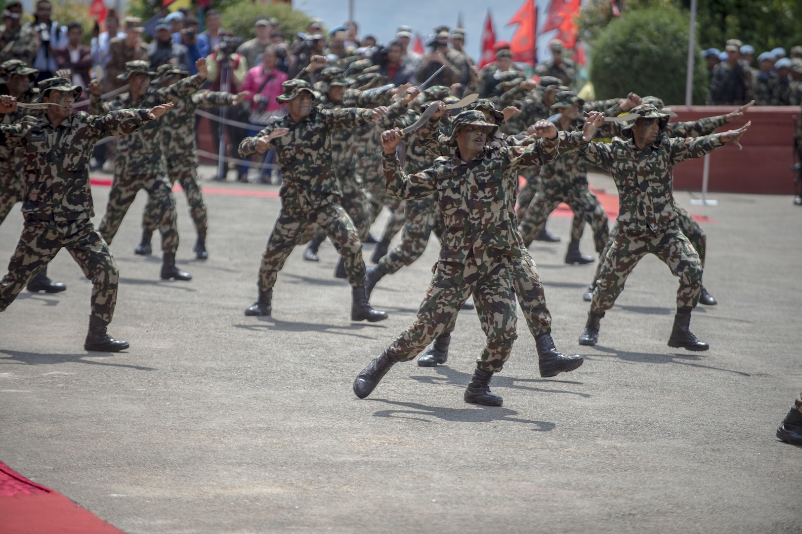 Nepalese army rangers known as “Ghurkas” perform a kukiri knife demonstration during the opening ceremony of exercise Shanti Prayas III in Nepal. Shanti Prayas III is a multinational United Nations peacekeeping exercise designed to provide pre-deployment training to U.N. partner countries in preparation for real-world peacekeeping operations. (U.S. Navy Photo by Petty Officer 2nd Class Taylor Mohr)