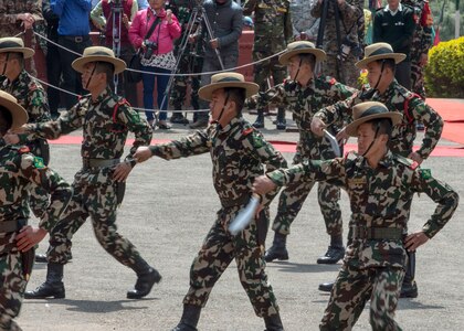 Nepalese army rangers known as “Ghurkas” perform a kukiri knife demonstration during the opening ceremony of exercise Shanti Prayas III in Nepal. Shanti Prayas III is a multinational United Nations peacekeeping exercise designed to provide pre-deployment training to U.N. partner countries in preparation for real-world peacekeeping operations. (U.S. Navy Photo by Petty Officer 2nd Class Taylor Mohr)