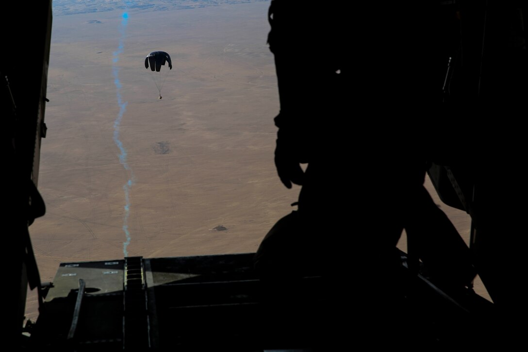 U.S. Marines with Marine Medium Tiltrotor Squadron 165, Special Purpose Marine Air-Ground Task Force-Crisis Response-Central Command, release cargo during an air delivery training exercise while forward deployed in the Middle East, March 9, 2017. The training served as an opportunity for the VMM-165 aircrew to increase their proficiency in aerial cargo delivery. SPMAGTF-CR-CC is a well-trained crisis response unit that has the ability to project combat power over vast distances using organic aviation, logistical and ground combat assets. (U.S. Marine Corps photo by Lance Cpl. Shellie Hall) 