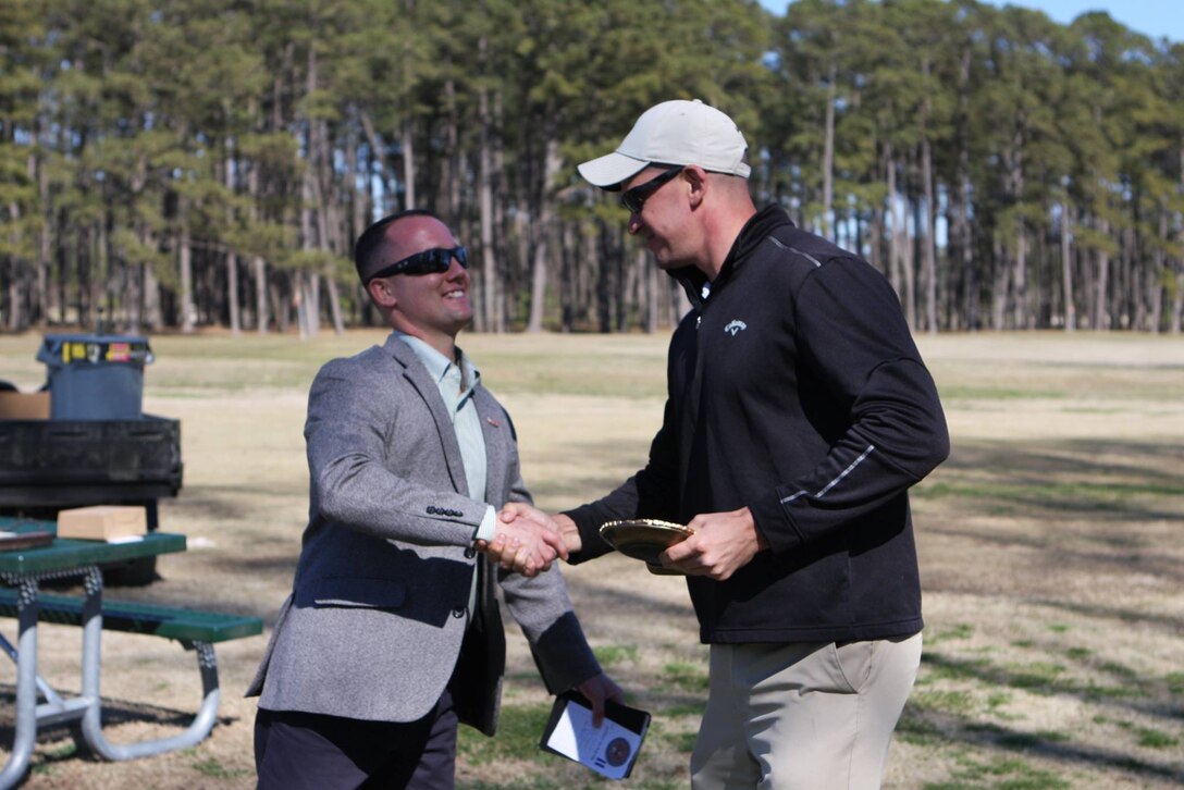 On March 17, 2017 MCES sponsored an Engineer Golf Tournament at the Paradise Point Golf Club to build camaraderie within the engineer community, family, and friends. Captain Bryan Peterson presents the 'Closest Pin' award.   