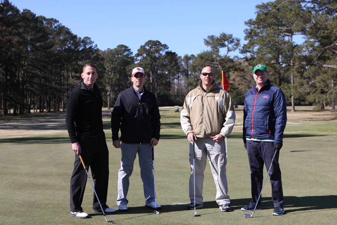 On March 17, 2017 MCES sponsored an Engineer Golf Tournament at the Paradise Point Golf Club to build camaraderie within the engineer community, family, and friends. Pictured are: Captain Dave Padgett, Captain Zack Pinkerton, Master Gunnery Sergeant Tim Bogie, and Major Travis Aiello.  