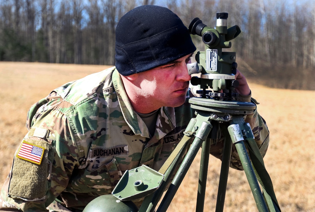 Army Spc. Buchanan uses an M2A2 Aiming Circle to orient an M252 81 mm mortar during an exercise at Fort A.P. Hill, Va., March 13, 2017. Buchanan is assigned to the 1st Battalion, 3rd United States Infantry Regiment “The Old Guard.” Army photo by Sgt. Steven Galimore