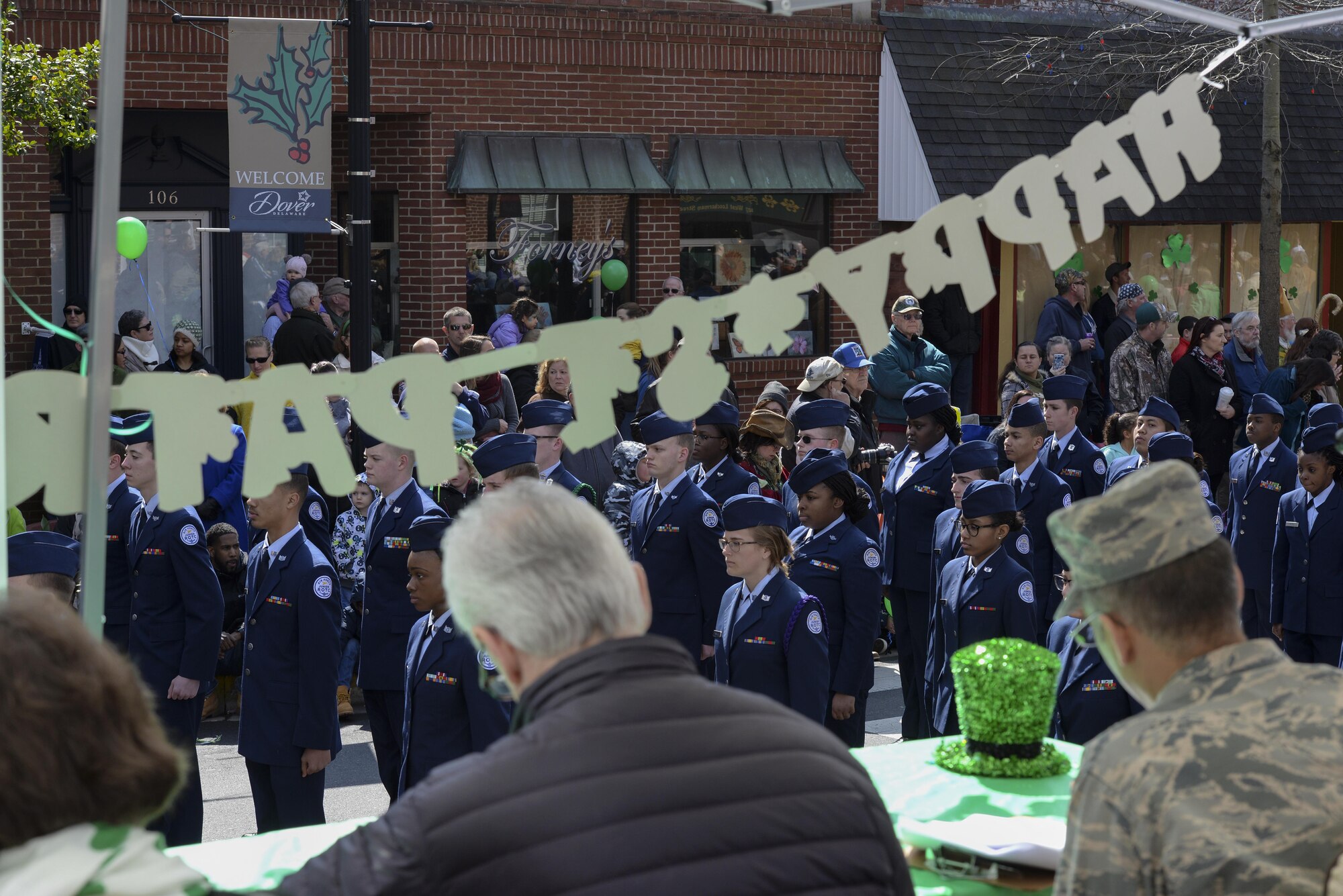 Members of a local Junior Reserve Officer Training Corps march past the judges during the St. Patrick’s Day Parade March 18, 2017, in Downtown Dover, Del. The team showcased their marching skills honed by the course curriculum. (U.S. Air Force photo by Senior Airman Aaron J. Jenne)