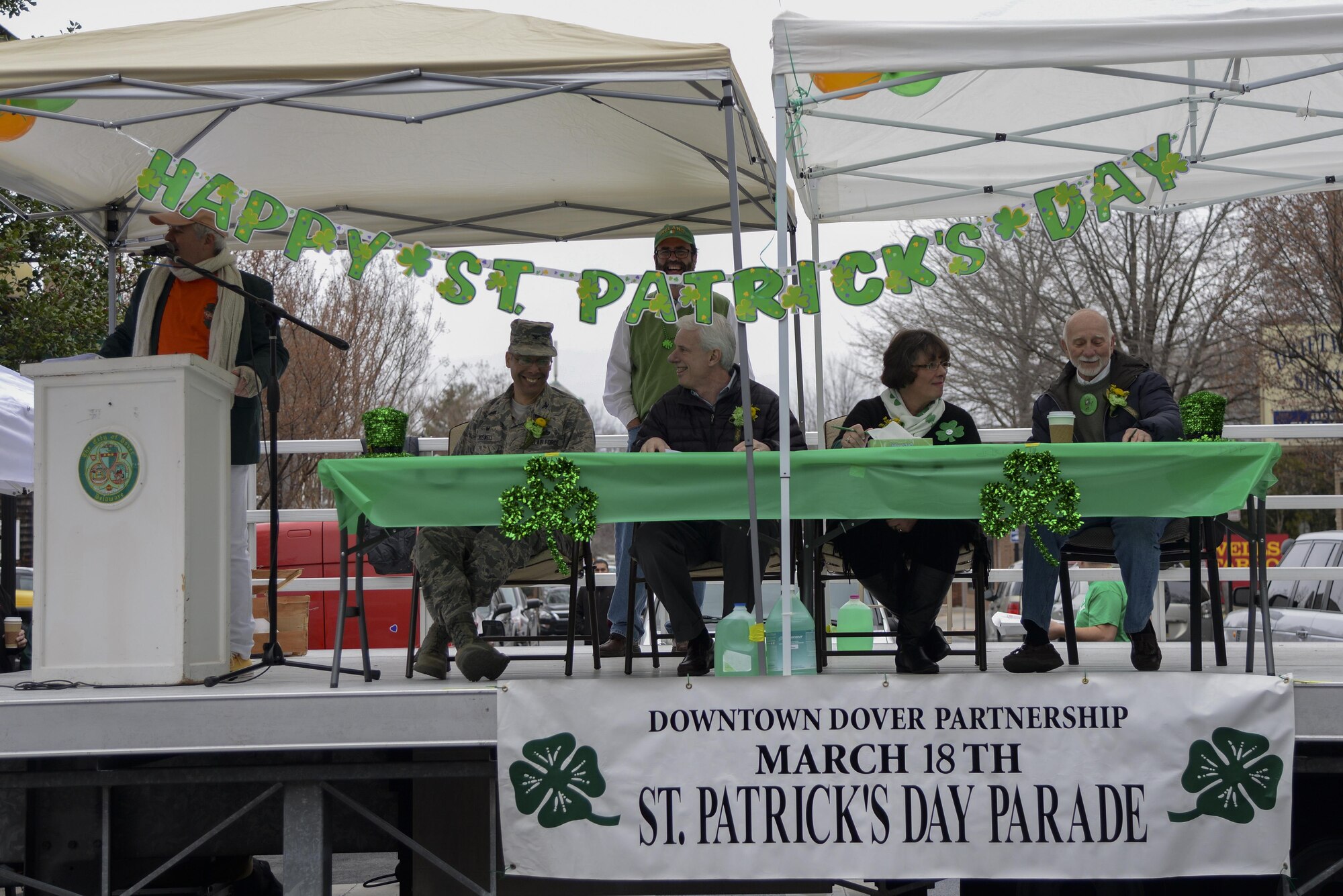 Col. Randy Boswell, 436th Mission Support Group commander, sits with other community members selected to judge the St. Patrick’s Day Parade March 18, 2017, in Downtown Dover, Del. The judges observed 51 parade participants, and awarded 13 trophies to exceptional performers. (U.S. Air Force photo by Senior Airman Aaron J. Jenne)